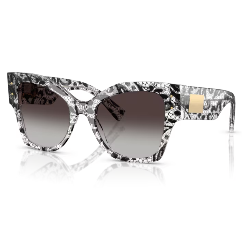 Dolce & Gabbana DG4478 32878G cat-eye in acetato nero effetto pizzo con lenti grigio sfumate su sfondo bianco