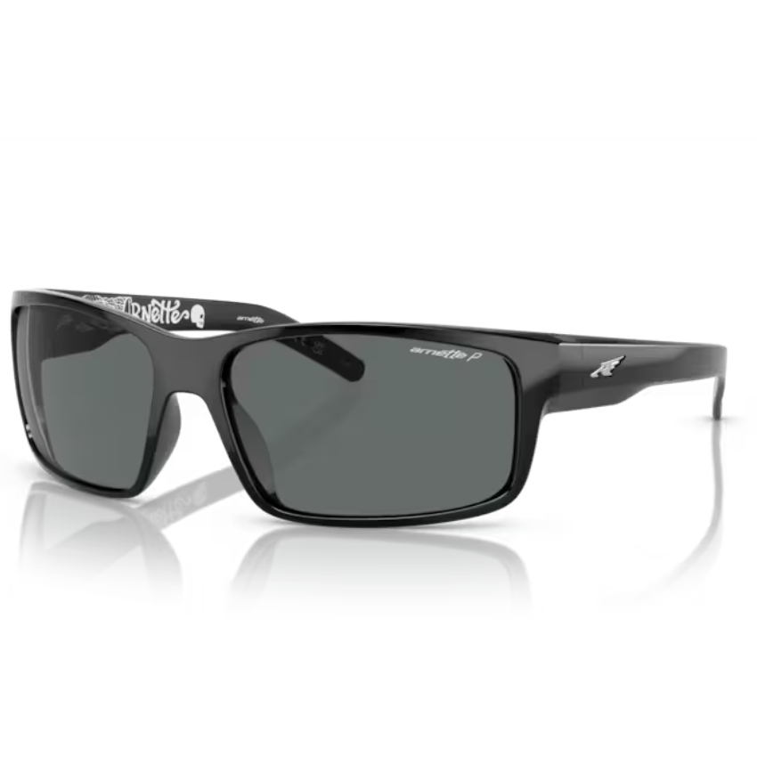 Occhiali da sole Arnette Fastball AN4202 226781 Nero Lucido con lenti grigio scuro polarizzate, montatura sportiva avvolgente e logo argentato